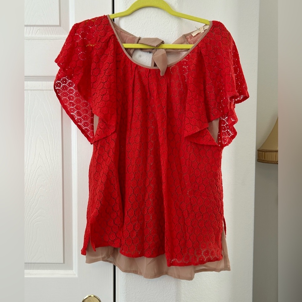 Ryu : Red knitted blouse with tan lining and bow tie close back